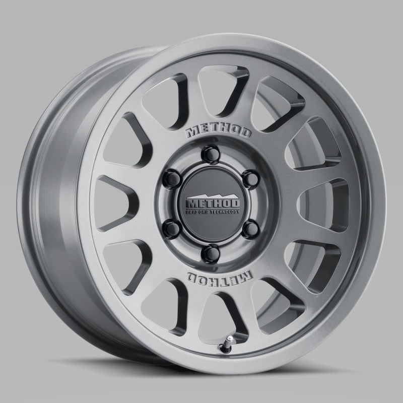 Method MR703 17x8.5 0mm Offset 5x5 71.5mm CB Gloss Titanium Wheel